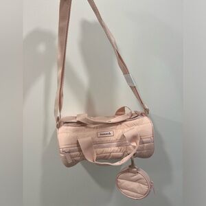Light pink Reebok crossbody bag! Brand new never used!